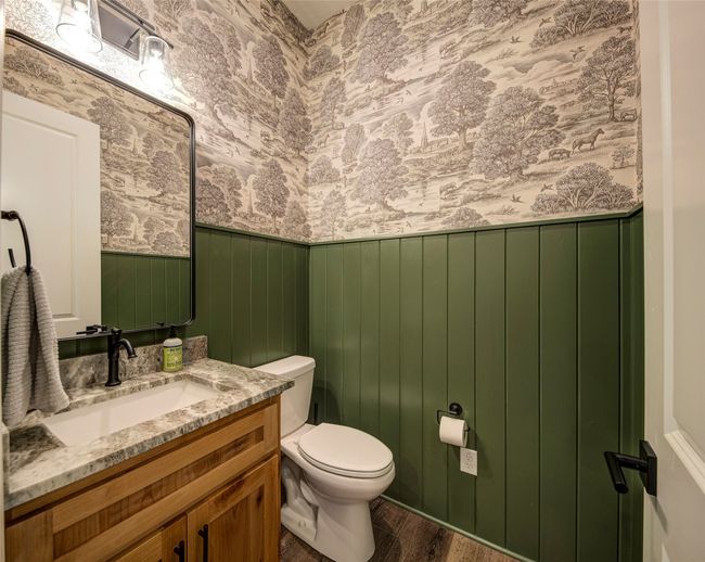 Bathroom with vanity, toilet, and hardwood / wood-style floors | Image 22
