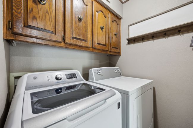 Laundry Room in Main House with Built-in Cabinets | Image 19