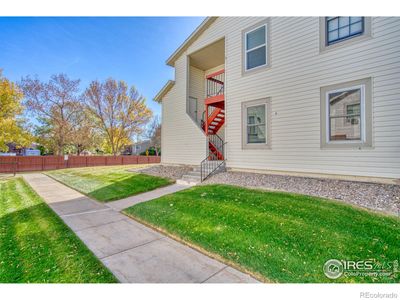 New turn-key upper floor unit overlooking open space. | Image 1