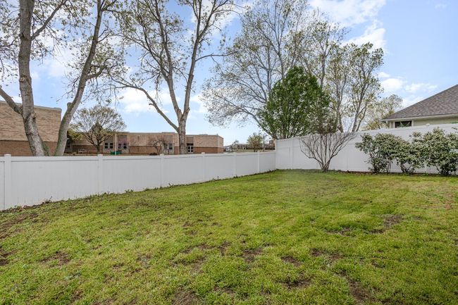 View of yard featuring a fenced backyard | Image 28