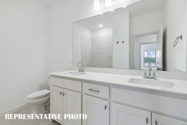 Guests will feel right at home in this beautifully finished guest bath. REPRESENTATIVE PHOTO | Image 15