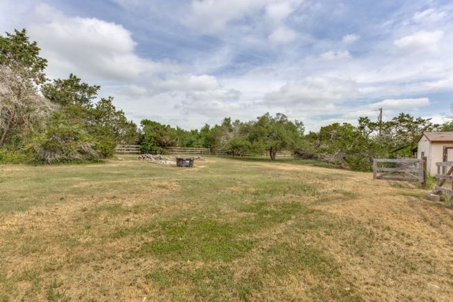 View of yard with fence and a rural view | Image 36