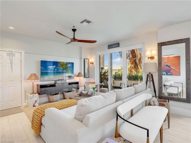 Living room featuring ceiling fan | Image 20