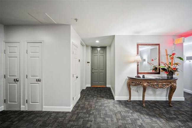 This is the elegant 10th-floor lobby, featuring tasteful decor and a quiet, welcoming ambiance. | Image 33