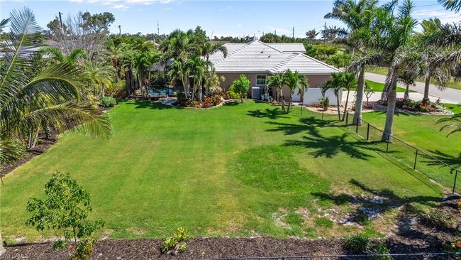Fenced in Adjacent lot with landscaping & irrigation | Image 47
