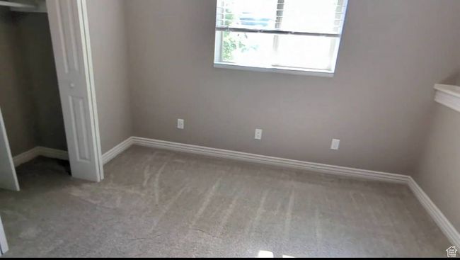 Unfurnished bedroom featuring carpet and baseboards | Image 46