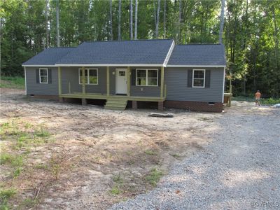 Single story home with covered porch | Image 1