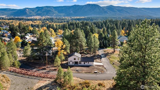As the newest PNW master-planned community, enjoy 200+ acres of open space, trails & the Coal Trax Mt Bike Park. Soaring ceilings in the great roommake each day worthy of celebration & open floorplan appeals to entertaining. Covered deck & patio. Southern-facing homesites range from the mid600s- 900ks. Enjoy a variety of innovative & distinctive new home options with the best all-season recreation just moments away! Built for the future, indulge in a retreat just 90-min to Seattle. Plans and elevations are artist’s renderings only, may not accurately represent the actual condition of a home asconstructed and may also contain options and upgrades which are not included in the sale. Trailside Homes reserves the right to make changes to the floorplan, specifications, dimensions, design and elevations without prior notice. Stated dimensions and square footage are estimated and should not be usedas representations of the home’s actual size. | Image 27