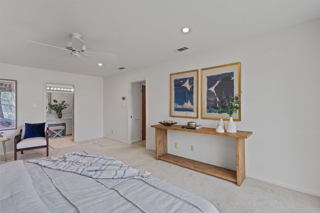 Primary bedroom is spacious with ample room for a sitting area | Image 27