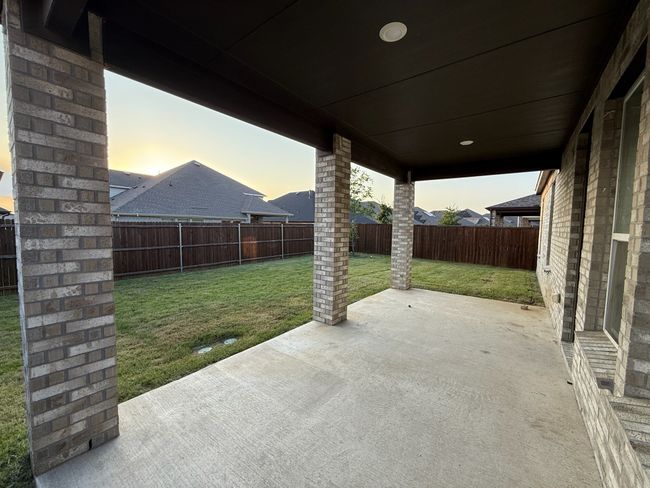 Patio terrace at dusk featuring a patio area | Image 19