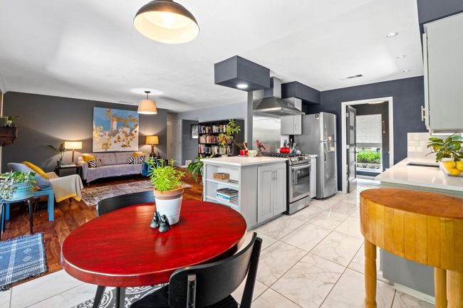 A corner view of the stunning kitchen and living areas, from the breakfast nook. | Image 28