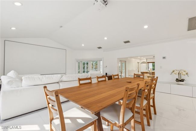 Dining area featuring vaulted ceiling, recessed lighting, and visible vents | Image 14
