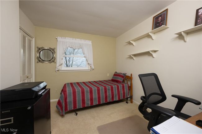Bedroom featuring baseboards, carpet floors, and a closet | Image 31