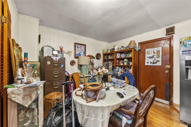 Dining room with light wood finished floors | Image 26