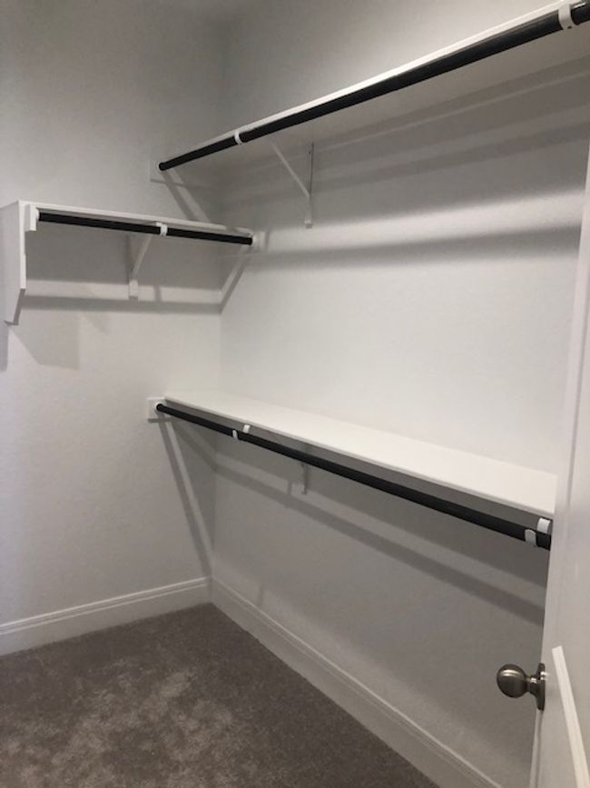Spacious closet featuring carpet floors | Image 17
