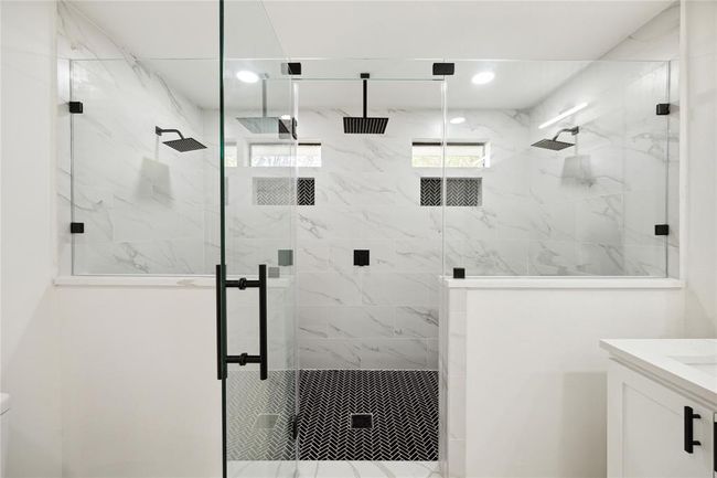 A close up view of the shower. | Image 14