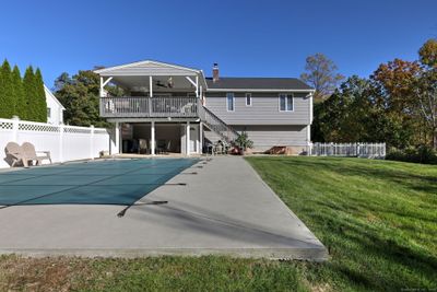 Pool area and back exterior of the home | Image 3