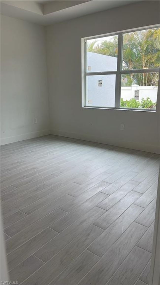 Primary bedroom suite with tray ceiling | Image 12