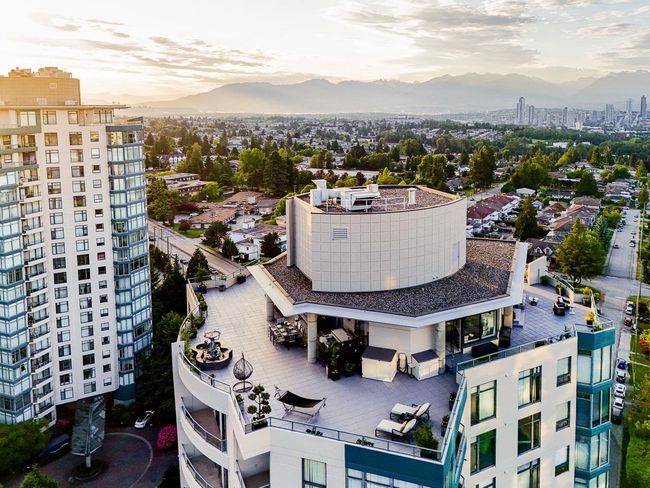 Aerial view at dusk of a mountain view and a view of city | Image 7