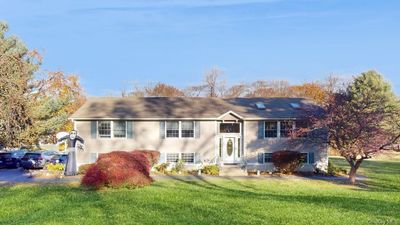 View of front of house featuring a front yard | Image 1