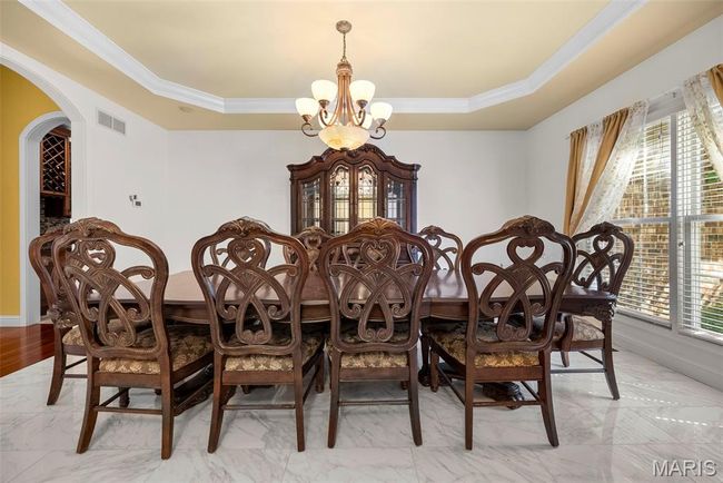 Formal Dining Room with tray ceiling. | Image 8