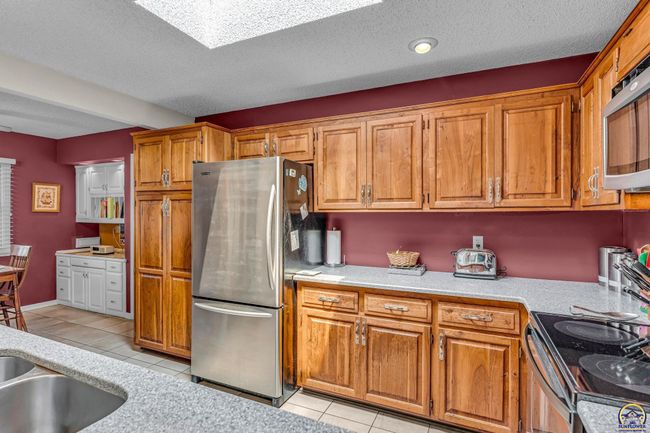 13 Sw Pepper Tree Ln, Townhouse with 4 bedrooms, 4 bathrooms and null parking in Topeka KS | Image 15