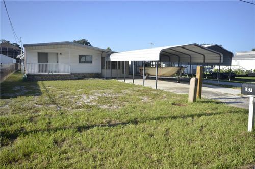 187 E Ariel Rd, Oak Hill, FL, 32759-9715 | Card Image