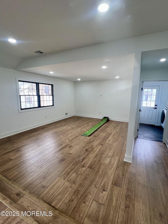 Sunken Family Room w/electric for dry bar & gas fireplace hookup | Image 12