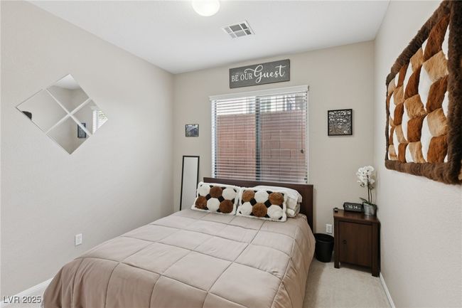 Bedroom with carpet flooring and baseboards | Image 32