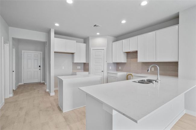 This photo is for illustrative purposes only and is not to be considered an exact replica of the finished home. Rendering does not match the finished product in terms of features, colors, landscaping, etc. Pricing, specifications, square footage and materials are subject to change at any time and without notice. | Image 4