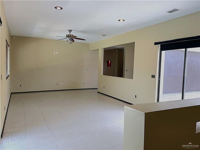 Unfurnished room featuring a ceiling fan, recessed lighting, and baseboards | Image 25