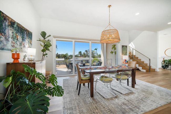 Dining area with west facing balcony | Image 23