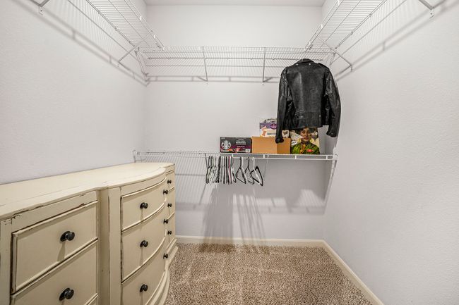 Spacious closet featuring carpet floors | Image 17
