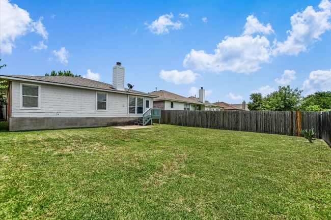 Back of property featuring a chimney | Image 25