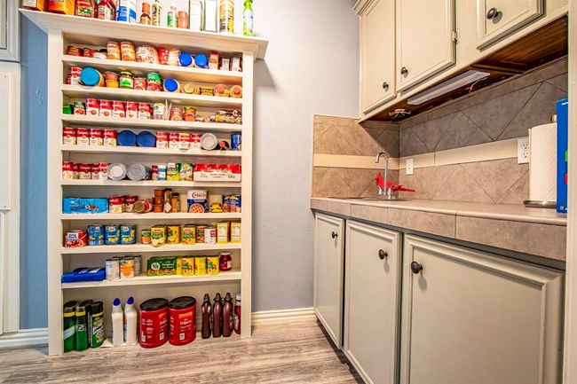 The pantry build in plus the cabinets on the right will give you even more storage space. | Image 12
