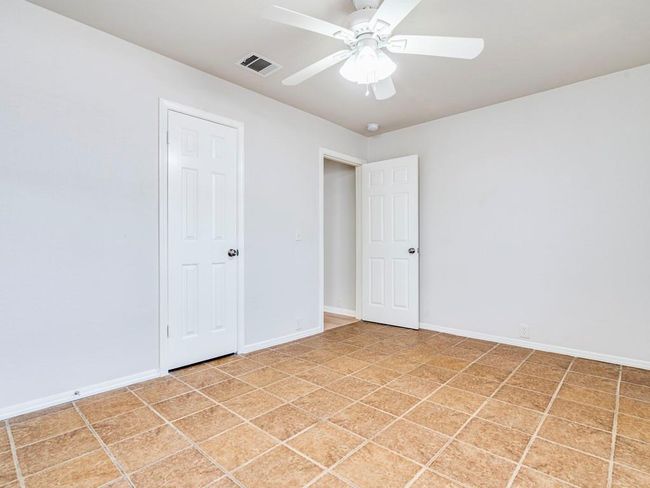 Unfurnished room featuring ceiling fan and baseboards | Image 24