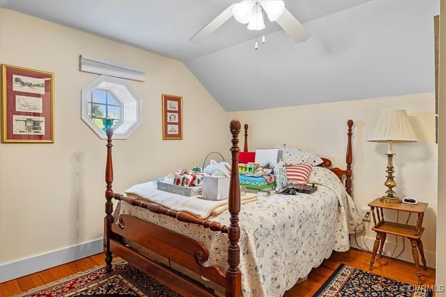 Bedroom with ceiling fan, original wood floors from 1957!!! Located for privacy on 2nd floor. | Image 22