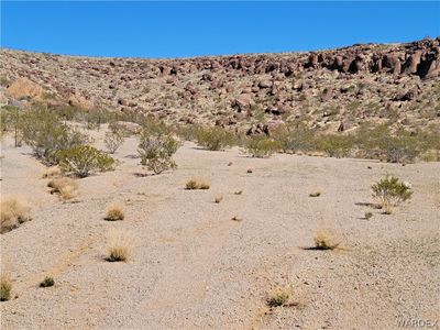 This 20 acres goes up on this bluff and over to the right but this would be a building site and would be fairly easy to pull power and we'd find a solution for water. Septic would be required. | Image 1