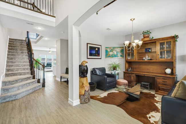 Upon entering, wood-like tile flooring that extends throughout. | Image 14