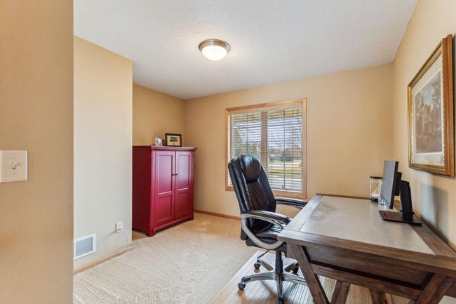 The plus of this large home is the main floor office. If you don't need an office it makes a perfect den. | Image 9