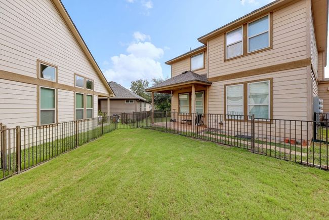 Great sized fenced-in yard with automatic in ground sprinklers. | Image 28