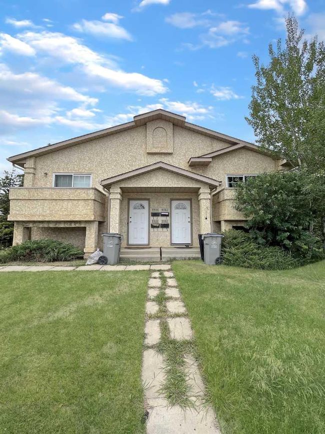 A - 9406 100 Avenue, Home with 2 bedrooms, 1 bathrooms and null parking in Grande Prairie AB | Image 1