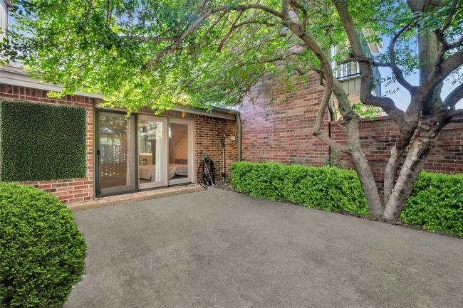 One of the largest back patio spaces in the community! With direct access to the pool & community greenbelt. | Image 24