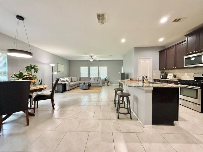 Family Room opens to kitchen & dining room | Image 10