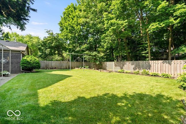 view of fenced backyard | Image 36