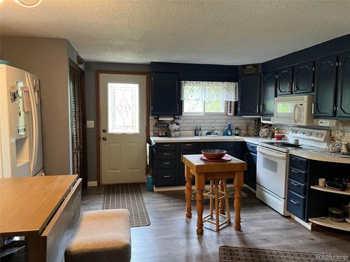 4564 Wildwood Rd, Alger, MI, 48610-9638 | Card Image