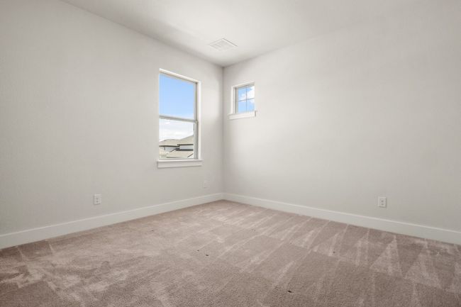 Unfurnished room featuring visible vents, carpet flooring, and baseboards | Image 25