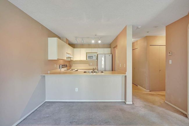 418 - 1219 Johnson Street, Condo with 2 bedrooms, 1 bathrooms and 1 parking in Coquitlam BC | Image 16