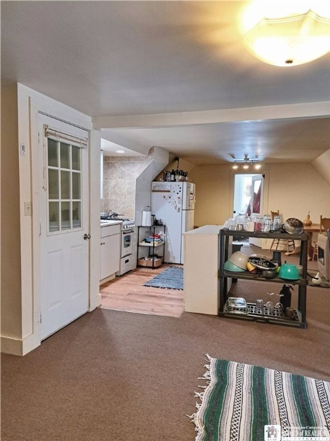 Upper Apartment - Living Room & Kitchen | Image 32