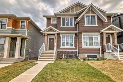 40 Edith Gate Nw, Home with 3 bedrooms, 2 bathrooms and 2 parking in Calgary AB | Image 1